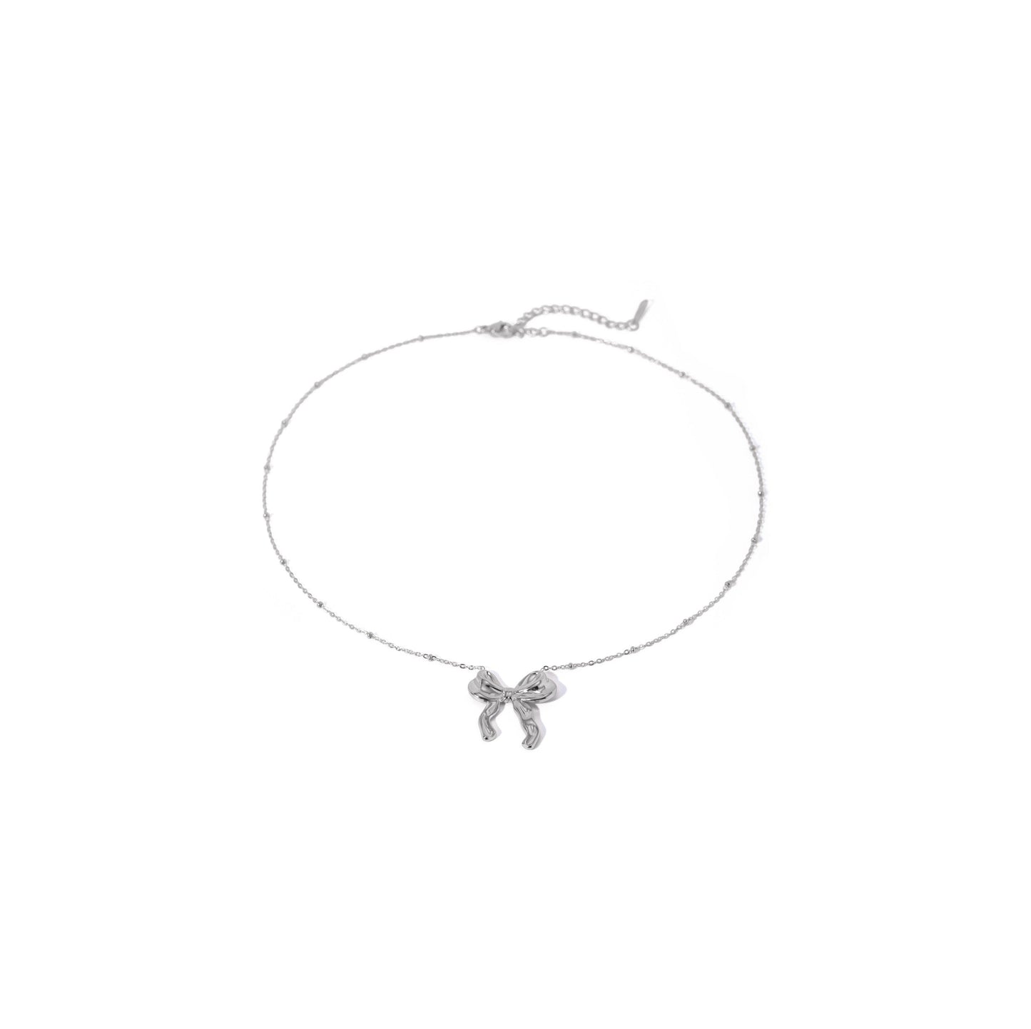 Silver bow ball chain necklace with delicate bow design and trendy ball chain.