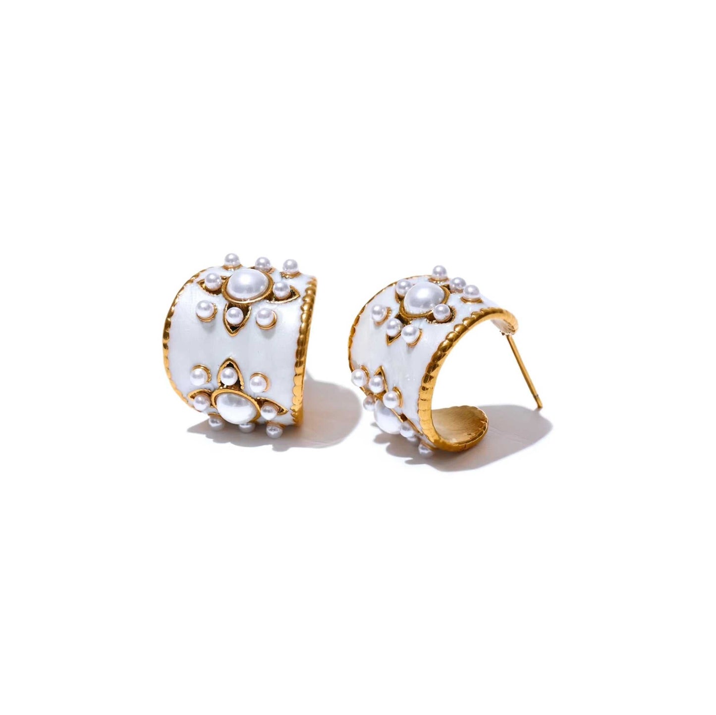Gold flower pearl earrings with delicate floral design.