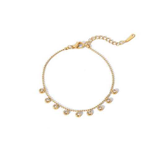 Gold beaded station bracelet with shimmering zircon stones, chain length 17cm, extender 5cm.