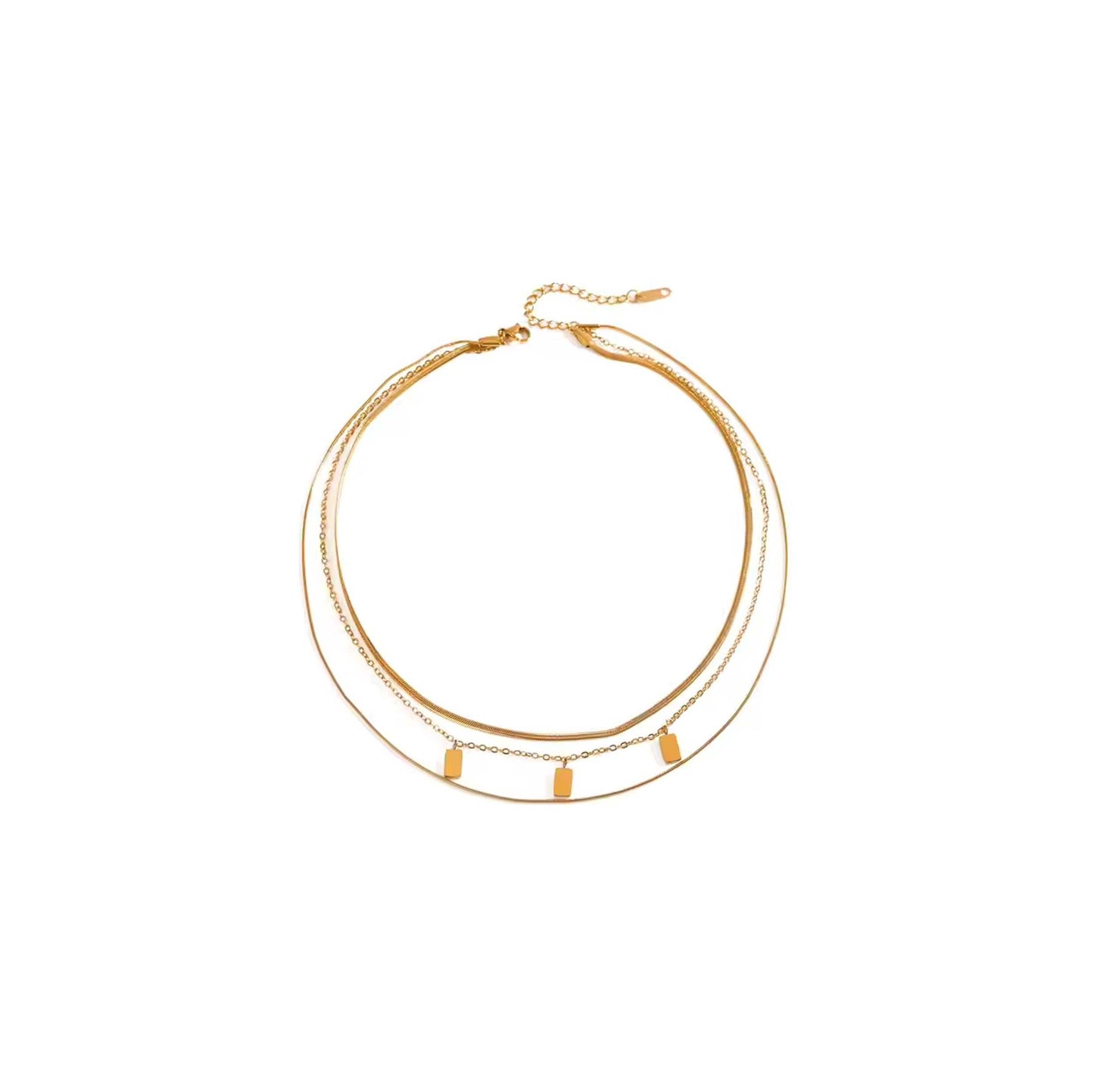 Gold mini tablet multi chain necklace with snake chains and tablet charms.