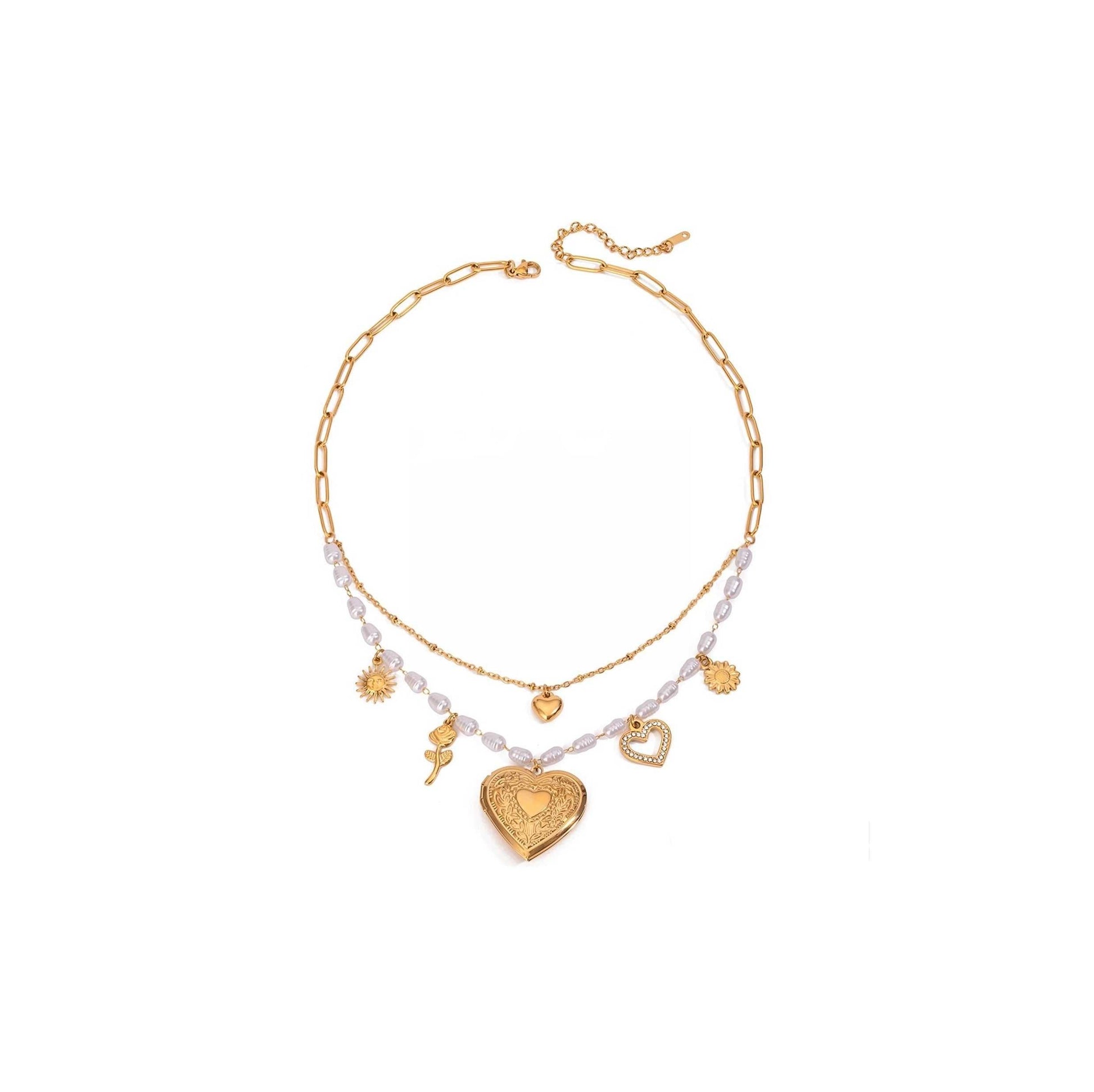 Gold pearls and hearts charm necklace featuring delicate pearls and playful gold charms on a double-layered chain.