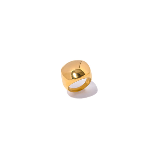 Gold round square ring with a bold and eye-catching design.