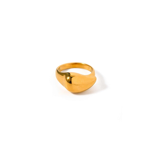 Gold water drop ring with unique droplet design.