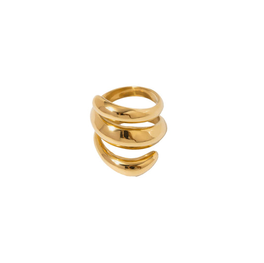 Gold Spring Ring with playful swirl design, statement accessory.