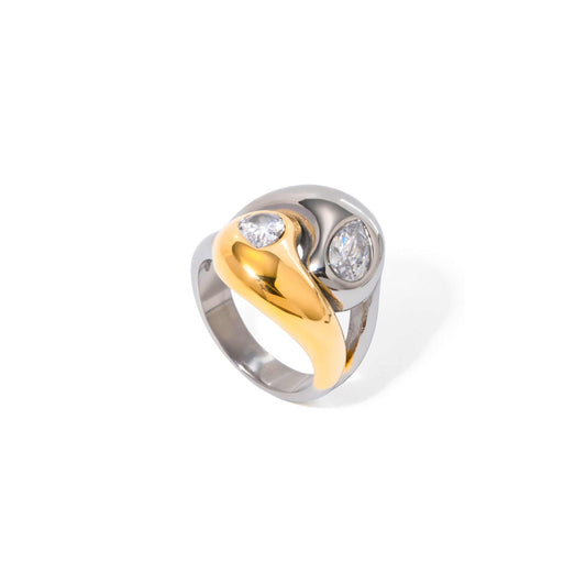 Mixed metal CZ ring with gold and silver water drop design.