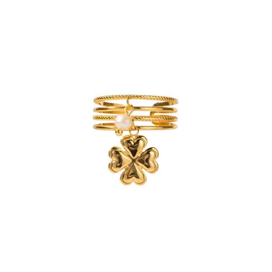 Gold 4 leaf clover charm ring with stackable design and adjustable fit.