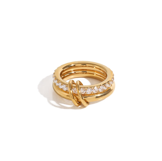 Gold CZ multi-layer ring with zircon stones, stackable design.