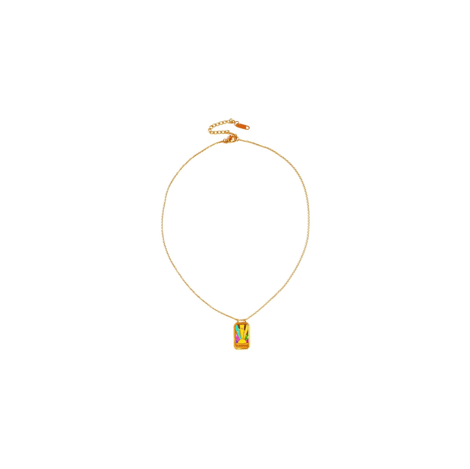 Gold Sunshine CZ tablet necklace with zircon pendant and red enamel heart.
