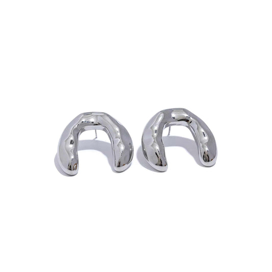 Silver Molten Arch earrings with hammered design and 28mm length.